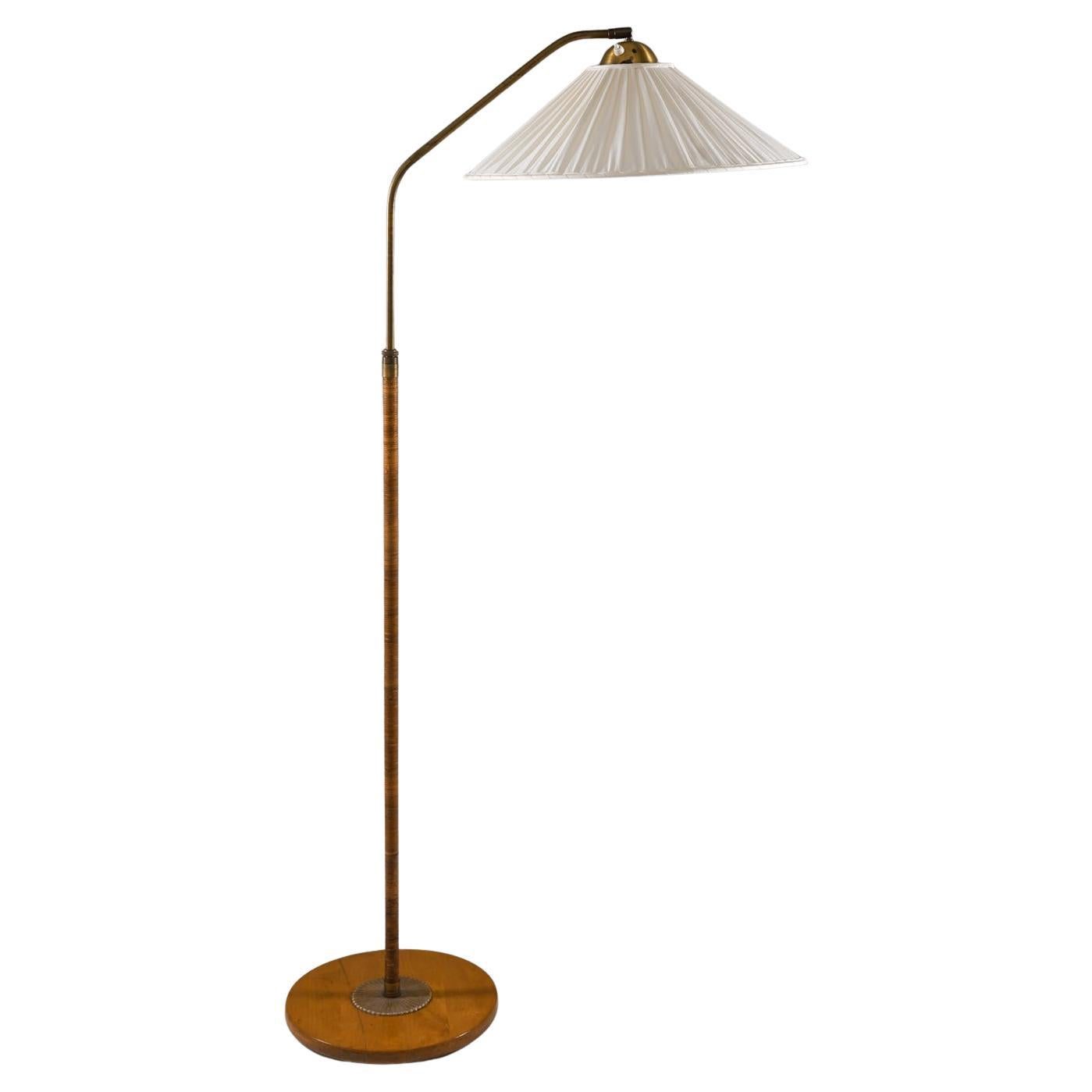 Swedish Modern Floor Lamp in Rattan and Brass, 1940s